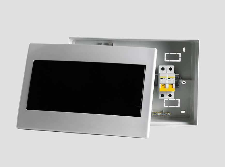 Plastic distribution board. Electrical board. Close-up. Isolated on light gray background.
